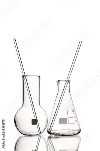 Two empty flasks with reflection isolated on white © Africa Studio