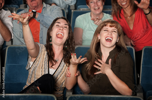 Laughing Women in Audience