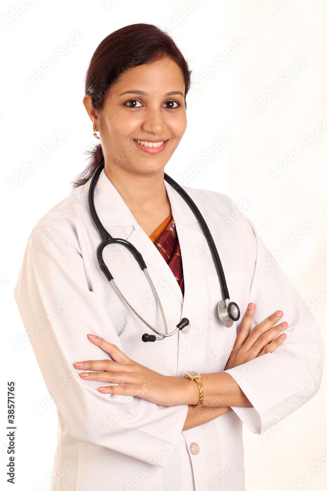 Cheerful young female doctor with crossed arms Cheerful young female doctor with crossed arms