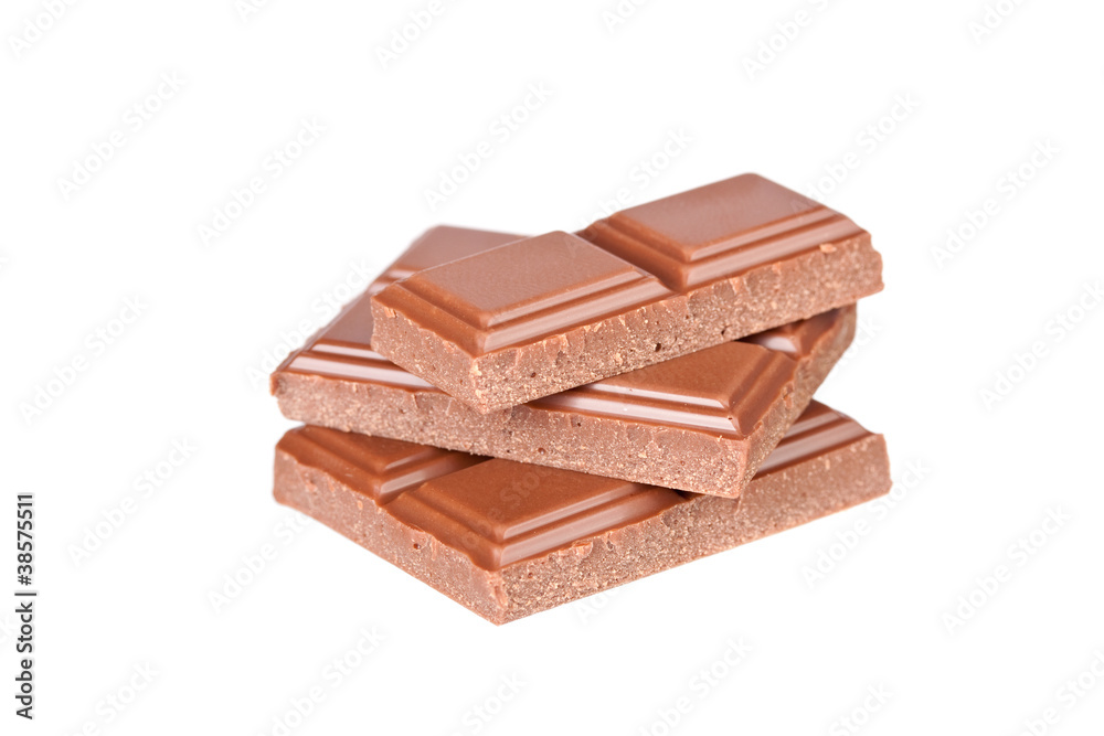 Chocolate pieces on the white background