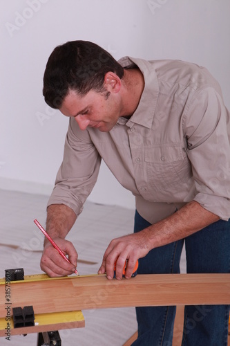 handyman with lead pencil