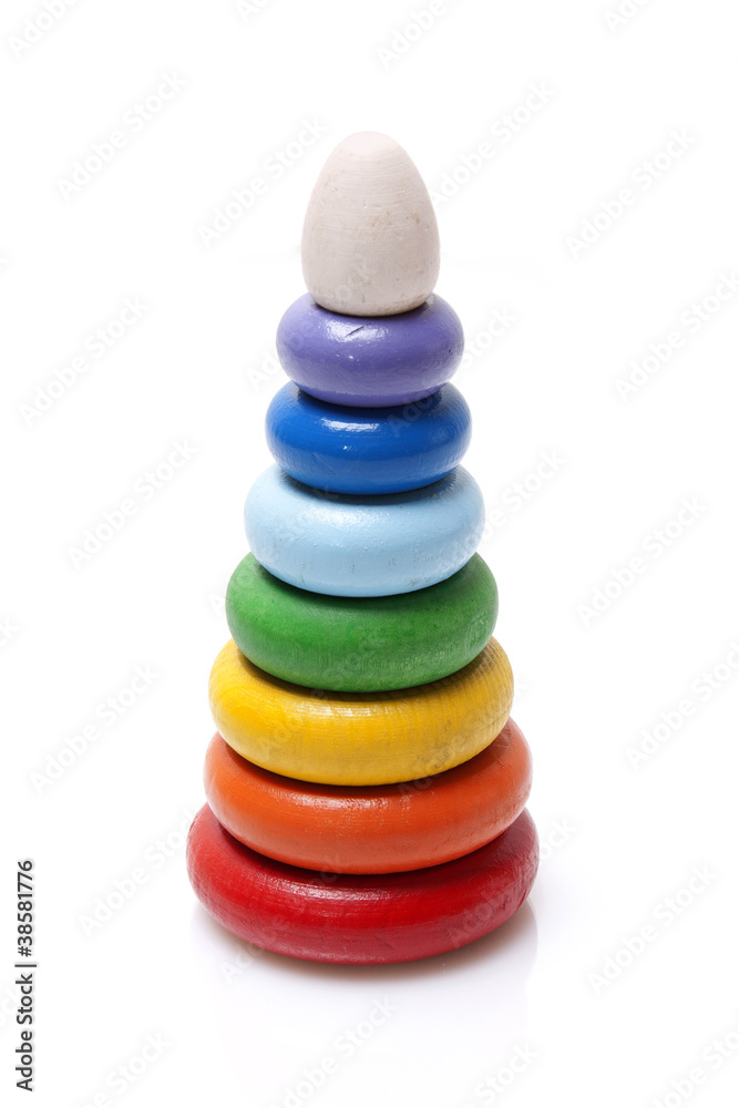 Colorful wooden pyramid toy on white background Colorful wooden pyramid toy on white background