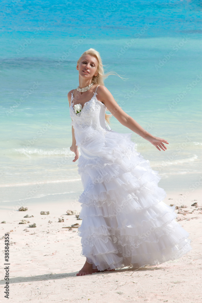 The young beautiful woman in a dress of the bride The young beautiful woman in a dress of the bride