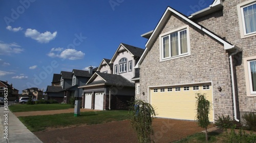 Wallpaper Mural panorama of brick house and other houses in street Torontodigital.ca