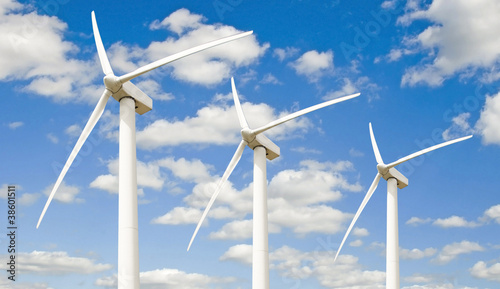 Three wind turbines -  against the sky photo