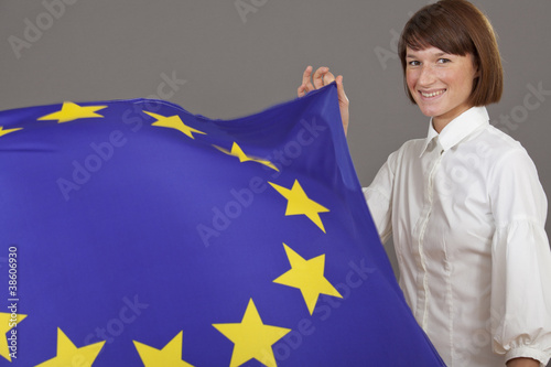happy woman holding european flag