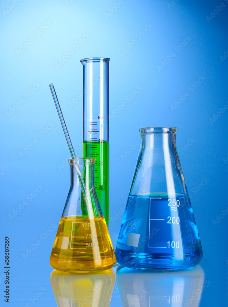 Three flasks with color liquid with reflection Three flasks with color liquid with reflection