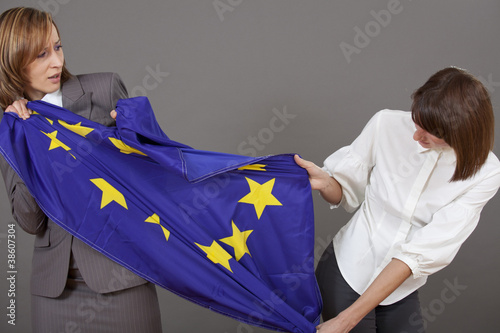women fighting over european flag