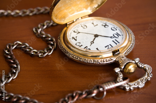 Old pocket watch with chain