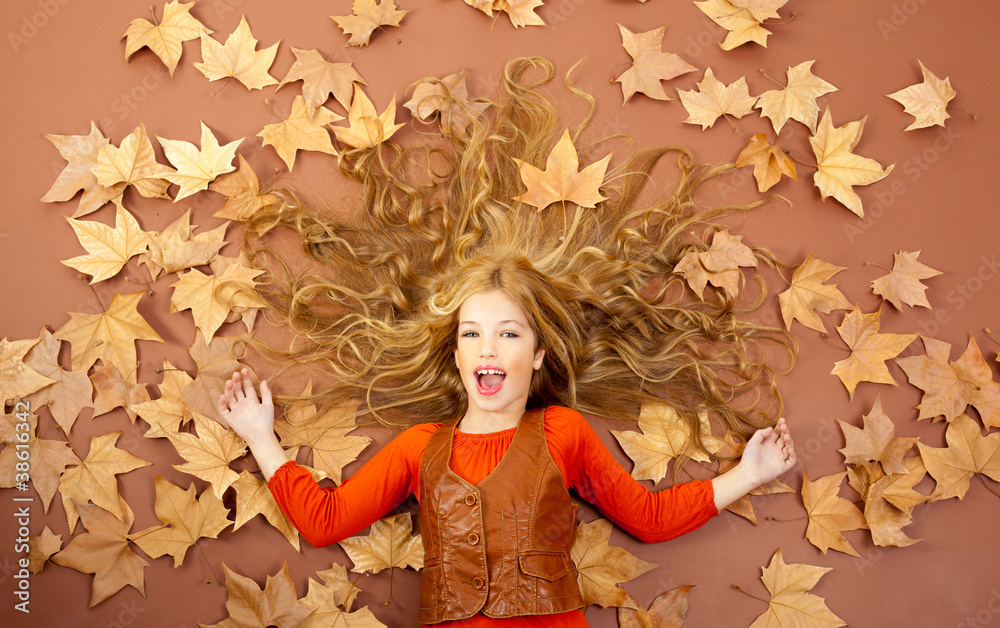 autumn fall little blond girl on dried tree leaves autumn fall little blond girl on dried tree leaves