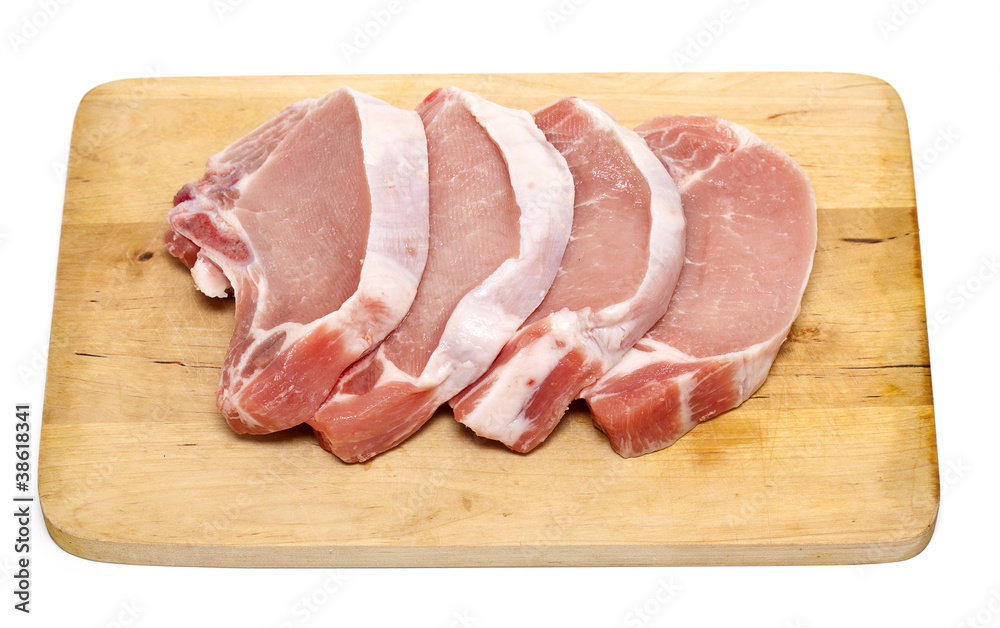 pieces of meat on wooden board pieces of meat on wooden board