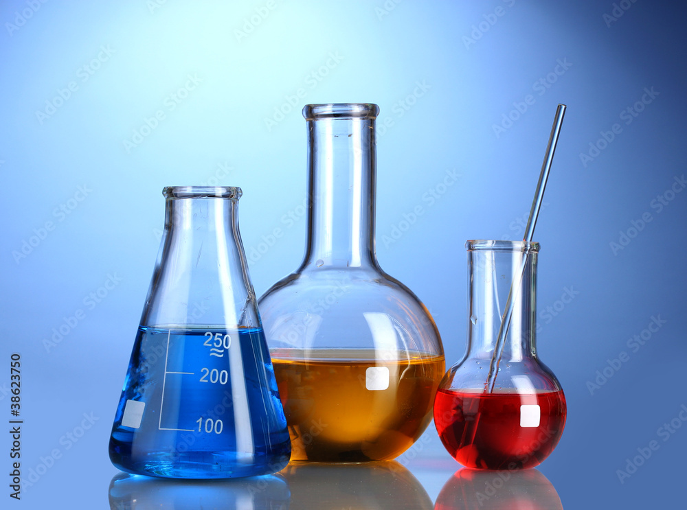 Three flasks with color liquid with reflection Three flasks with color liquid with reflection