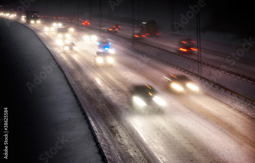 Traffic in snowstorm © Pink Badger