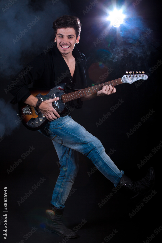 Cool man with electric guitar