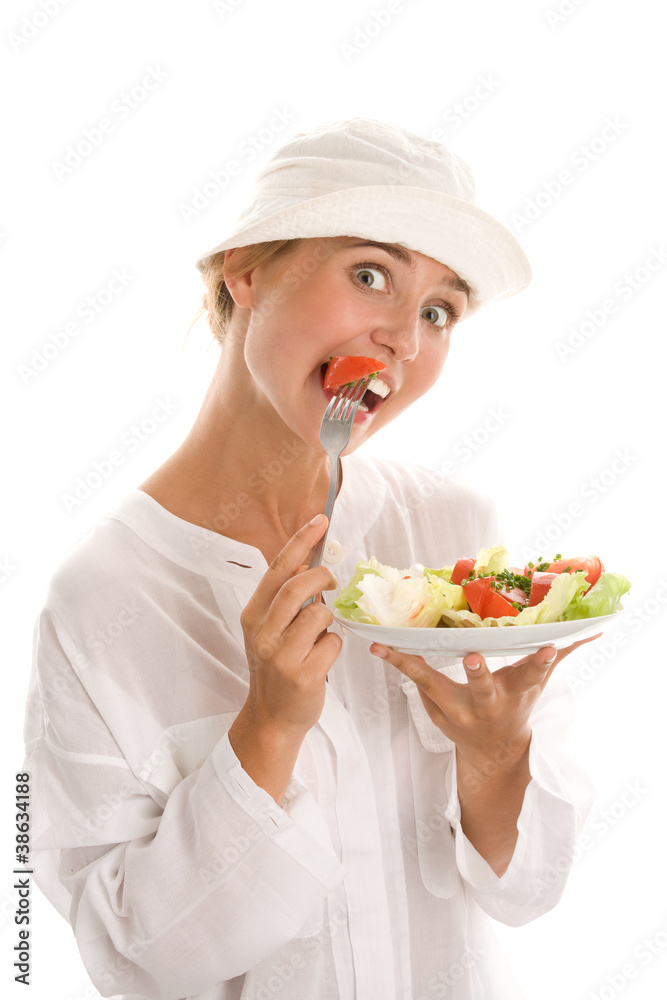 Woman eating salad