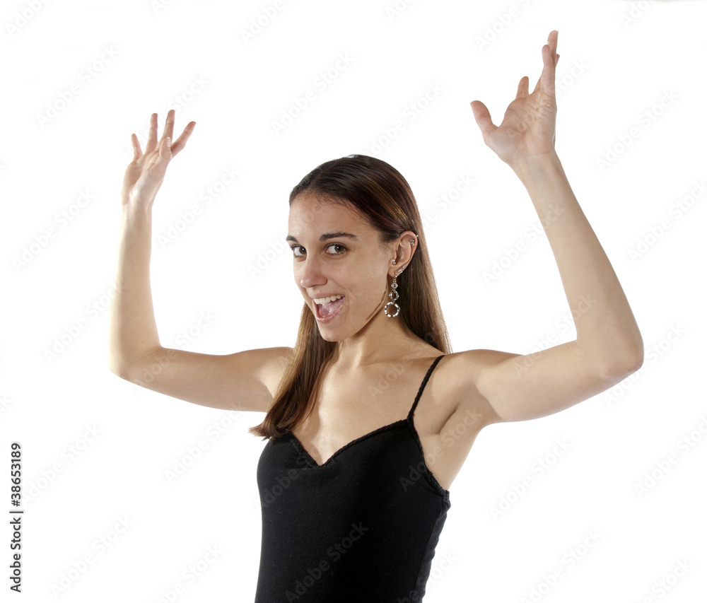 Happy young woman waving arms in the air. Happy young woman waving arms in the air.