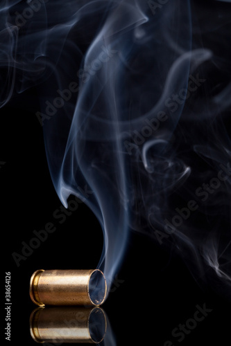 Smoking bullet casing