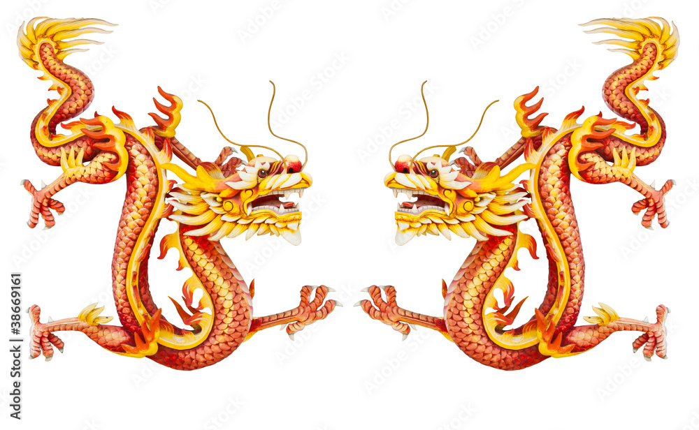 Twin golden dragon statues on white background
