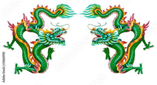 Twin green dragon statues on white background