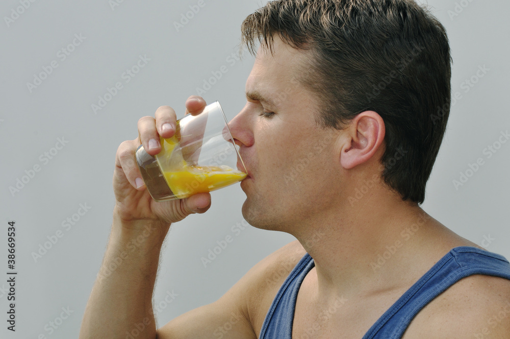 Fototapeta premium Athlete drinking egg