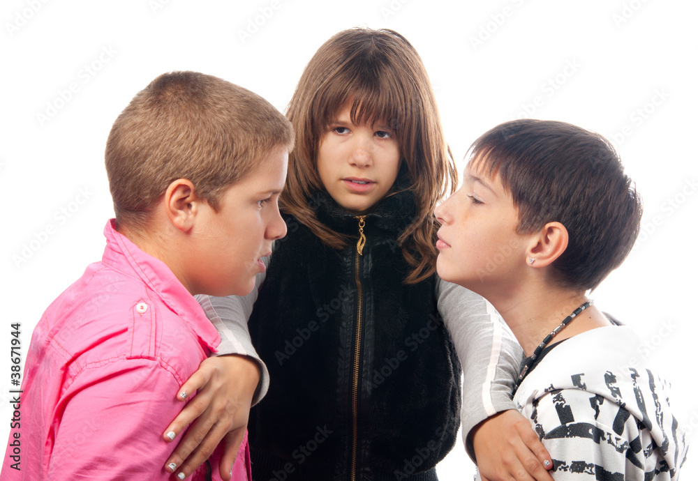 Teenage girl and two angry teenage boys that want to fight Teenage girl and two angry teenage boys that want to fight