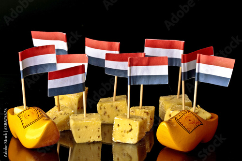 Dutch pickle cheese and clogs with dutch flags photo