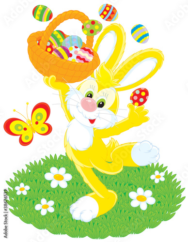 Easter Bunny dances with basket of colored eggs