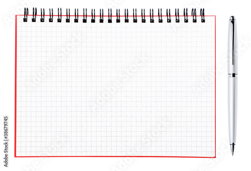 Silver pen and blank page of a notebook with black binder