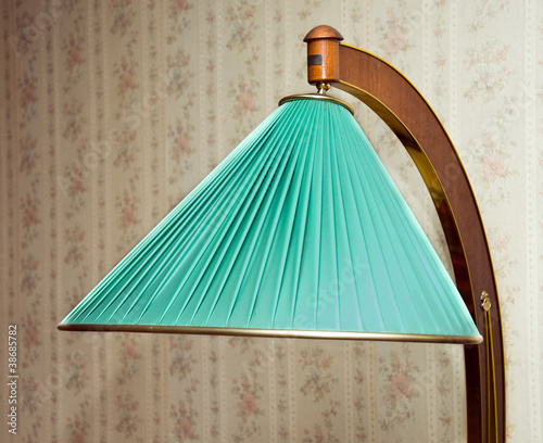 Retro electrical floor lamp with green lampshade photo