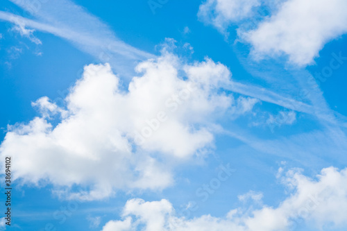 big white clouds in blue summer sky © vvoe