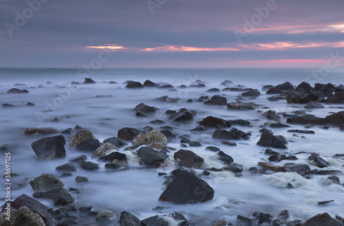 Rocky beach before sunrise