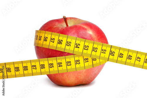 red apple and measuring tape