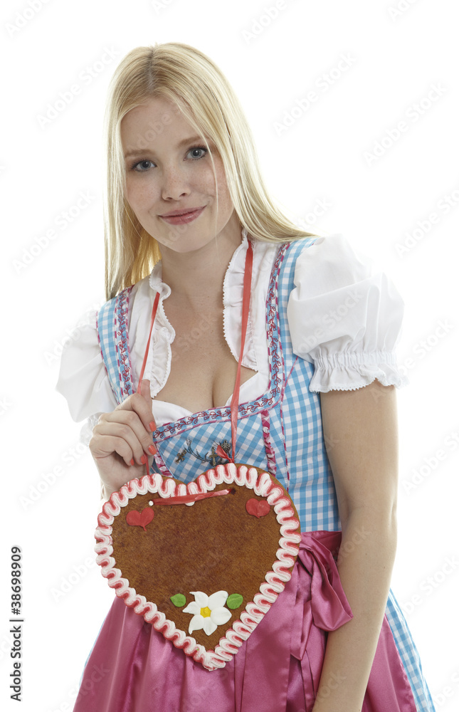 Woman with an empty German Gingerbread heart Woman with an empty German Gingerbread heart