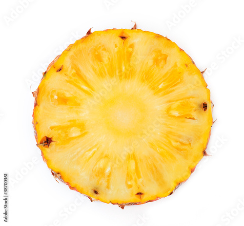 Pineapple slice isolated over white background.