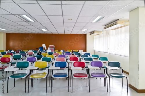 Colorful armchairs in class room