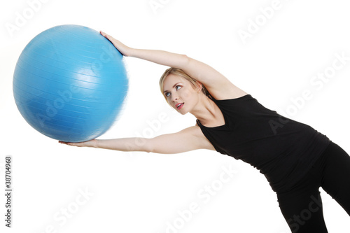 Young girl with fit ball