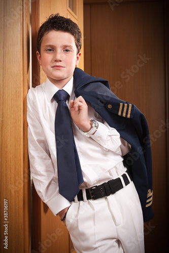 Handsome young boy in Holy Communion dress