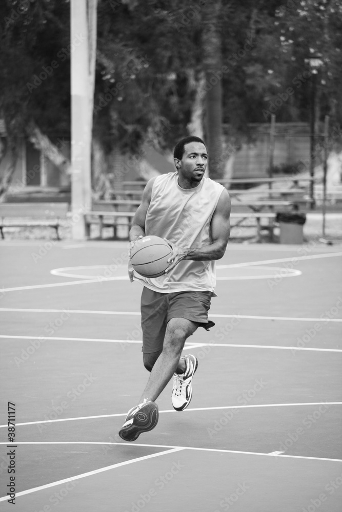 Basketball player running on the court