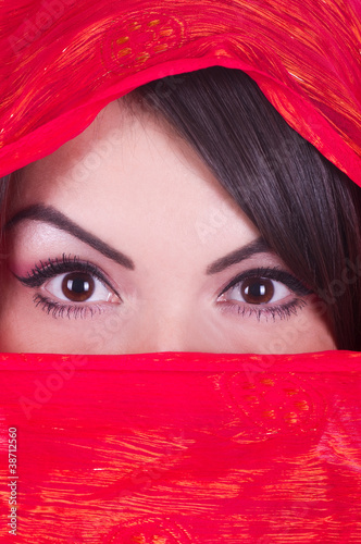 Εκτύπωση καμβά Beautiful girl is posing in red yashmak