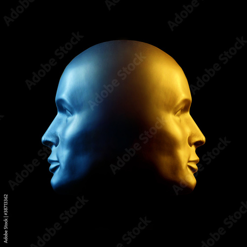 Two-faced head statue, blue and gold