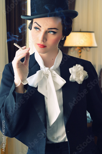 Beautiful girl in  old suit