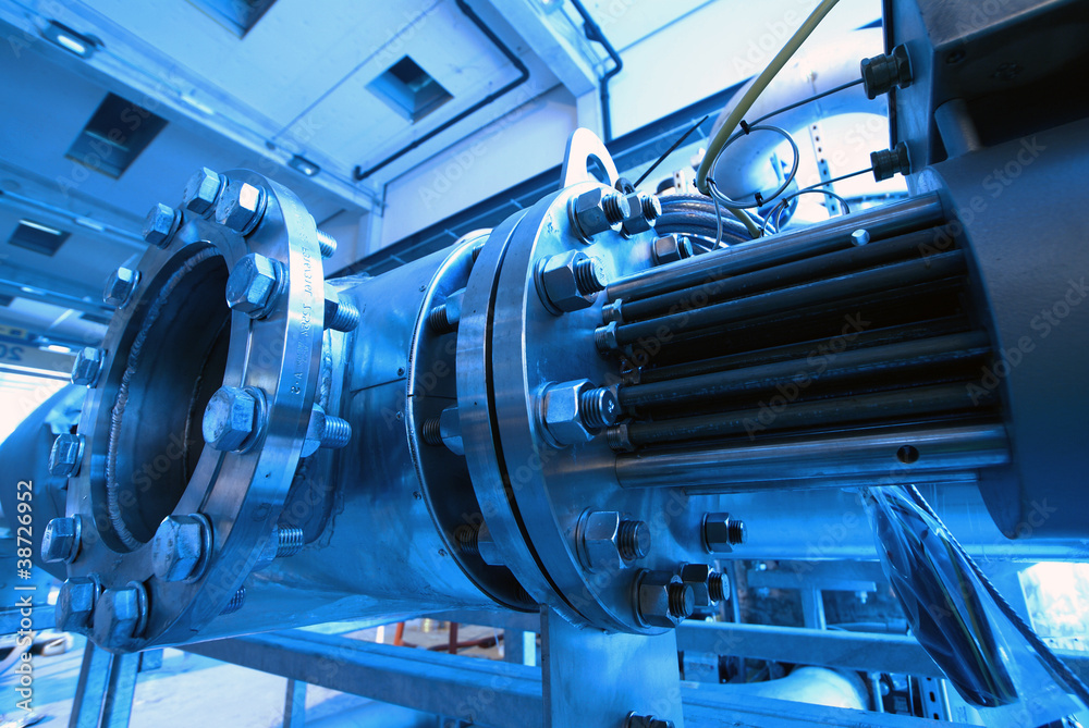 Obraz premium Industrial zone, Steel pipelines and cables in blue tones
