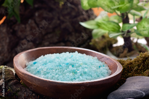 Spa setting with bath salt and floral water