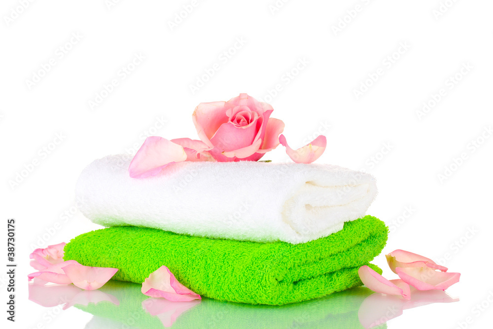 Towel and flower isolated on white Towel and flower isolated on white