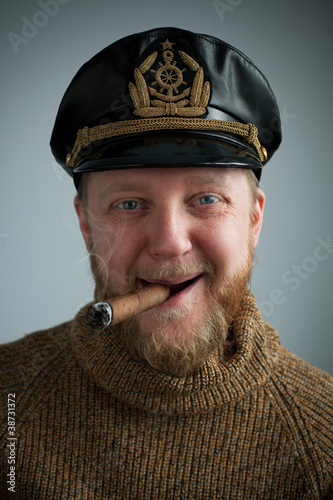 Seaman with a smoking cigar, knit sweater photo