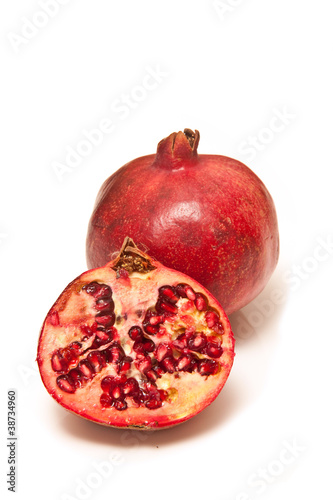 Pomegranate isolated on a white studio background.