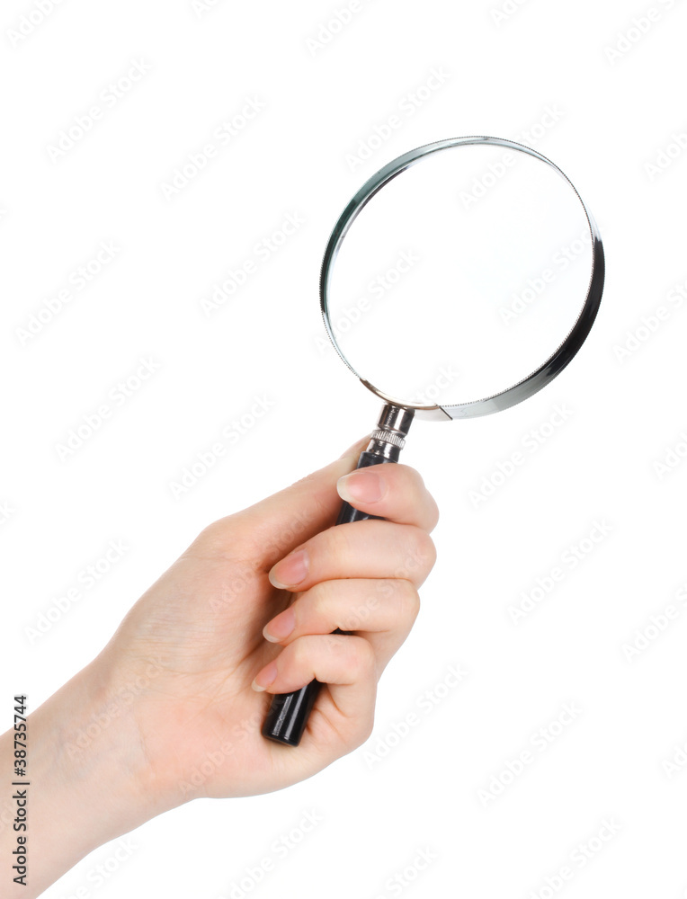 Magnifying glass in hand isolated on white Magnifying glass in hand isolated on white