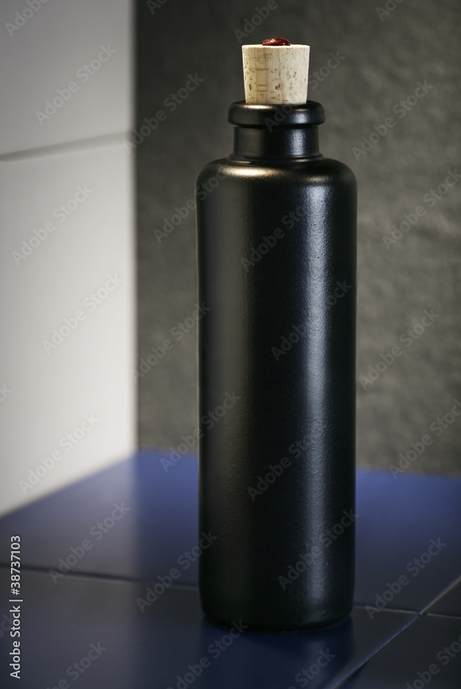 Black vinegar bottle in kitchen