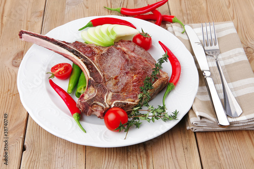 savory : roasted beef spare rib on white dish tomato photo