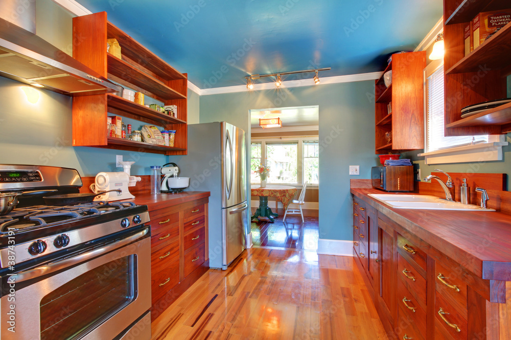 Shiny custom build kitchen with cherry wood. Shiny custom build kitchen with cherry wood.